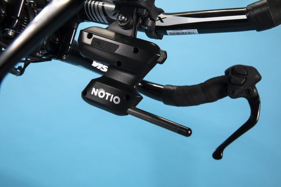 A Notio aerometer mounted beneath bicycle handlebars